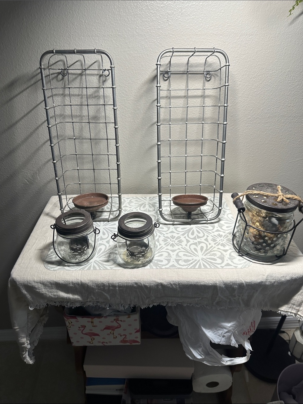 Rustic Metal Wall Sconces with Glass Jar Votives and a jar for aromatherapy